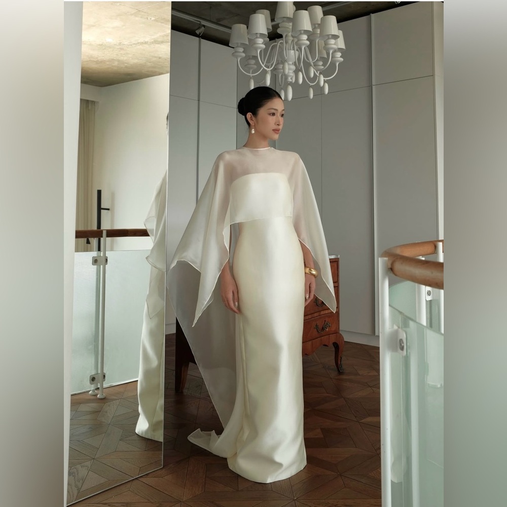Elegant White Gown with Sheer Cape